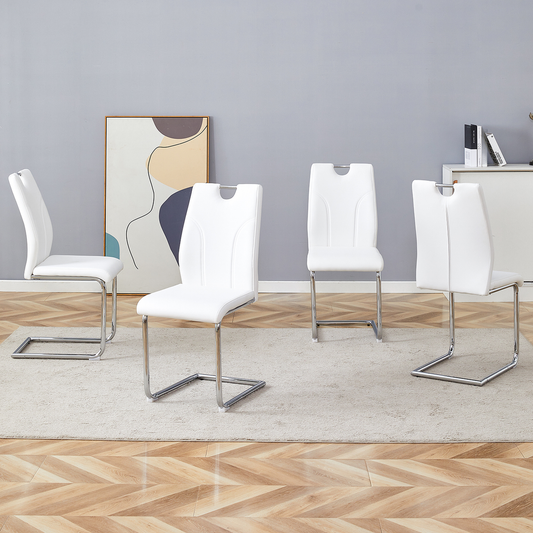 White faux leather dining chairs with chrome sled legs