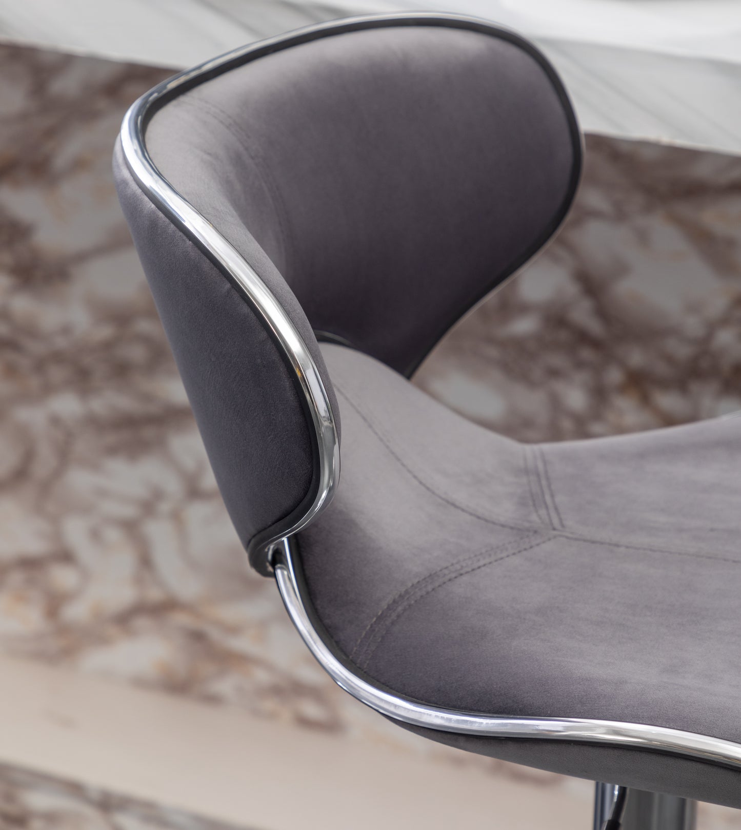 Gray velvet bar stool with chrome trim