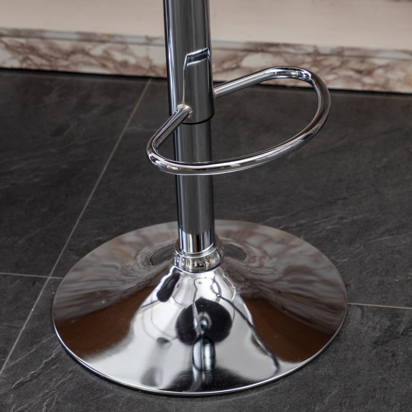 Shiny chrome adjustable bar stool base and footrest