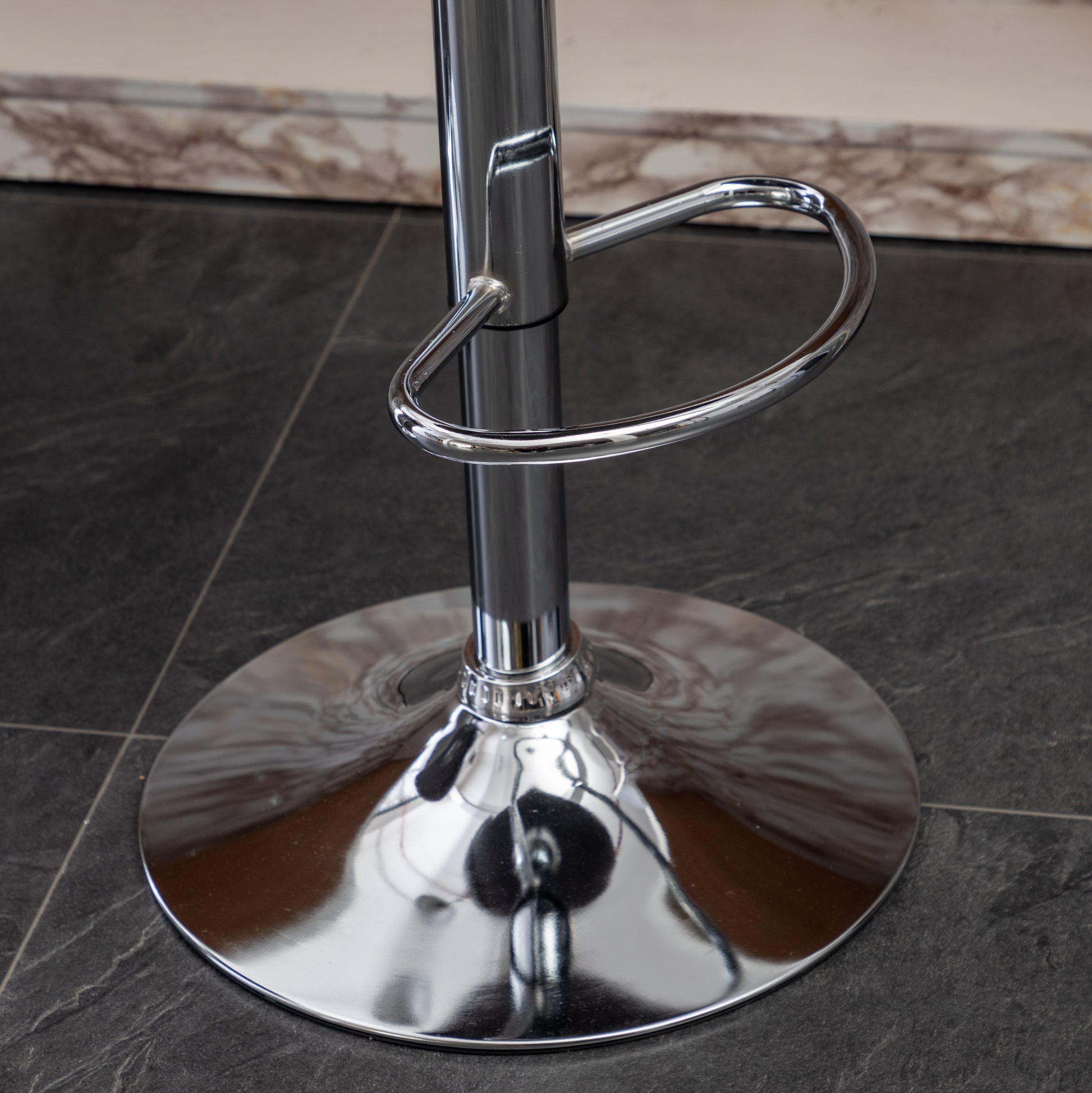Shiny chrome adjustable bar stool base and footrest