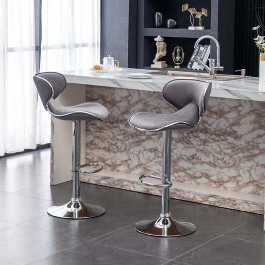 Grey velvet bar stool with chrome accents and adjustable height
