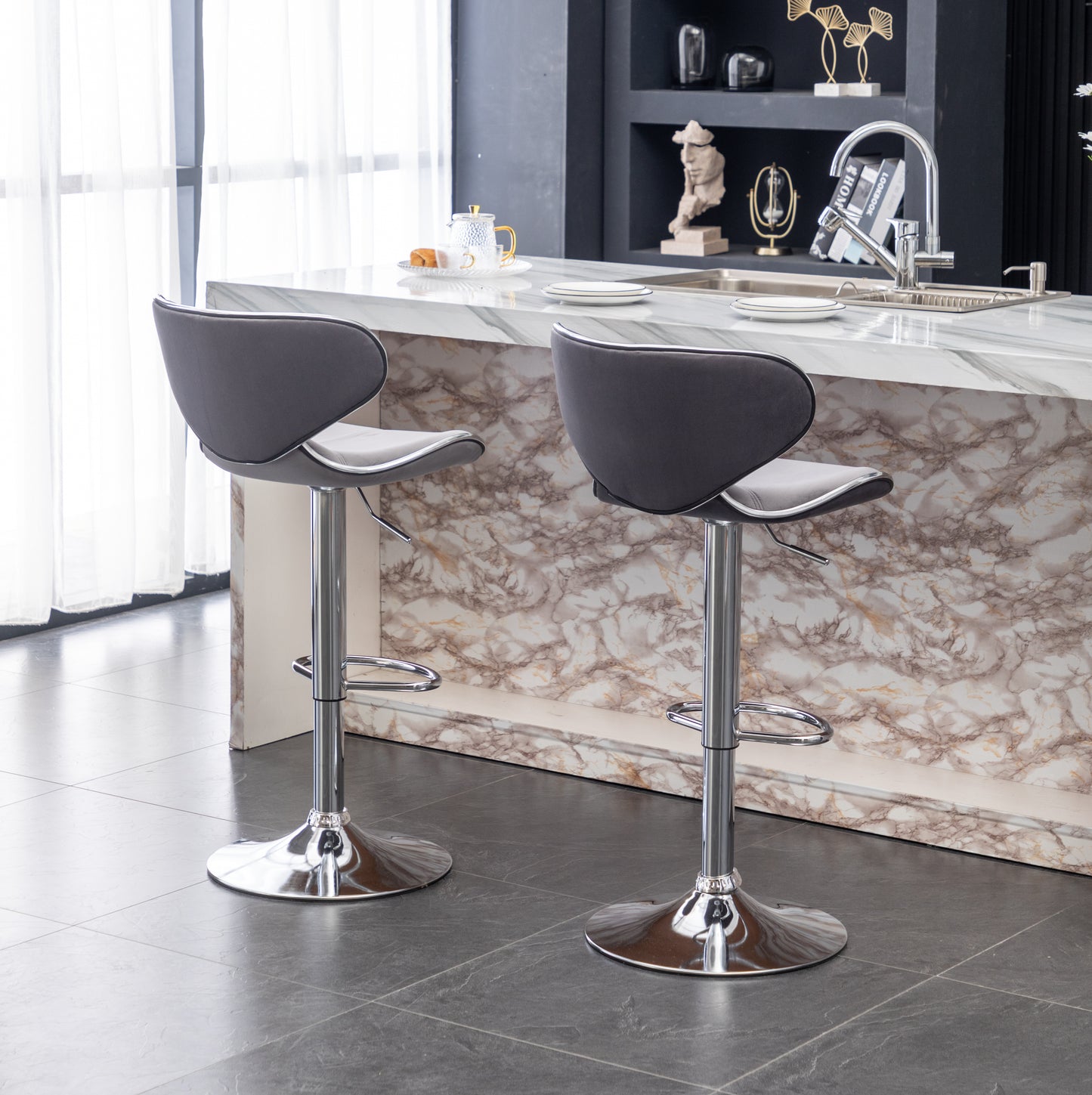 Grey upholstered adjustable bar stools with chrome bases