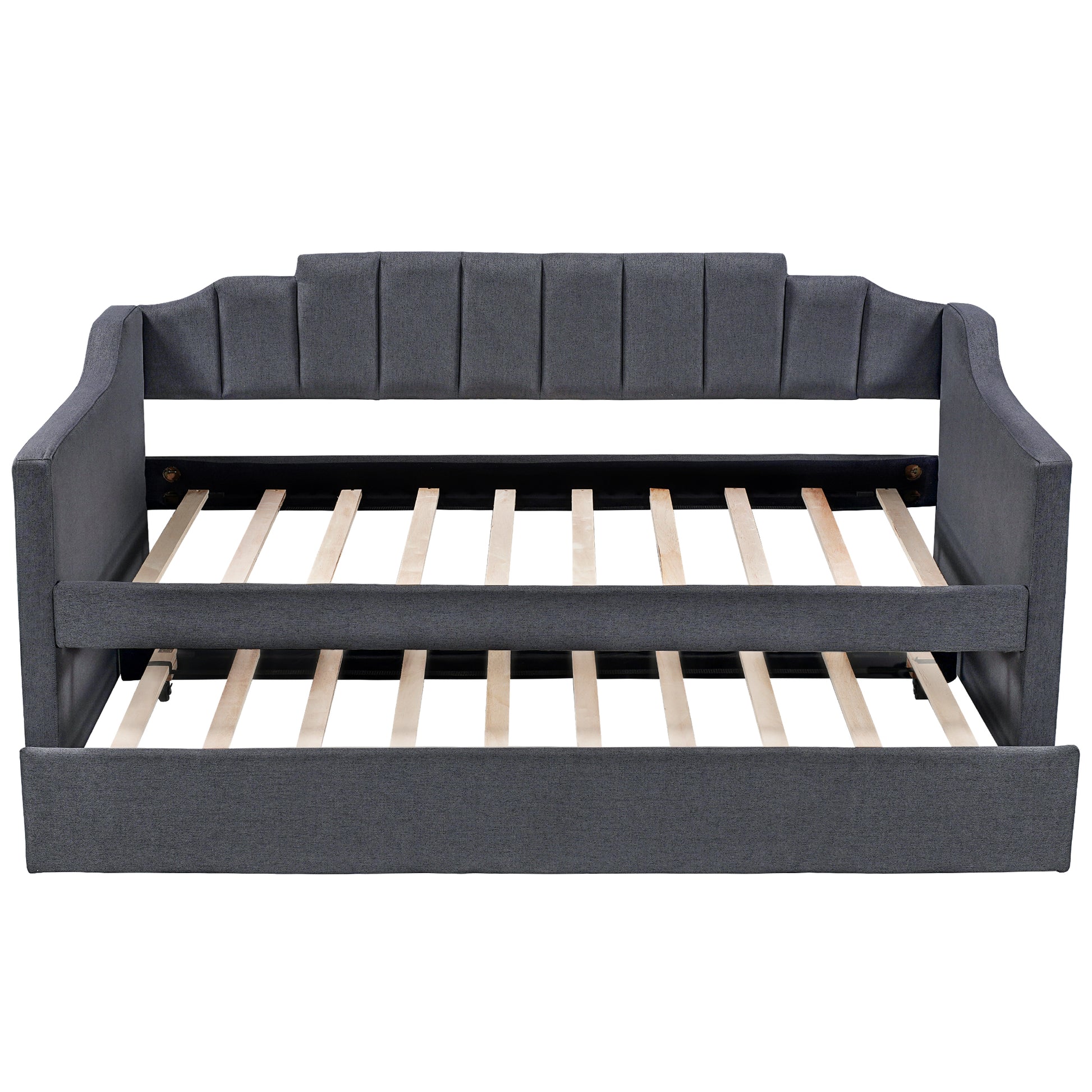 Dark gray upholstered daybed with channeled backrest and pullout trundle