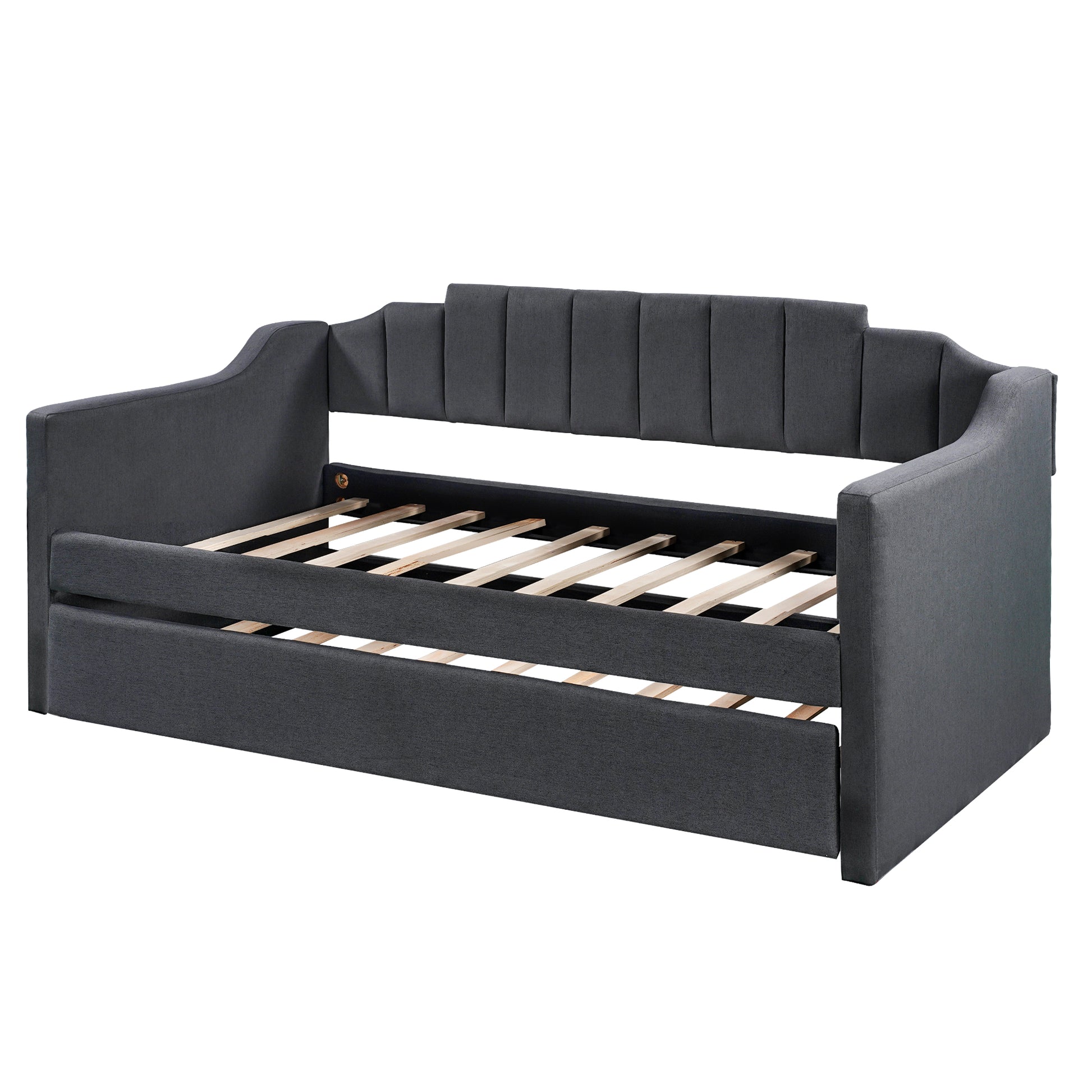 Dark grey upholstered daybed with channeled back and pullout trundle ideal for guest rooms