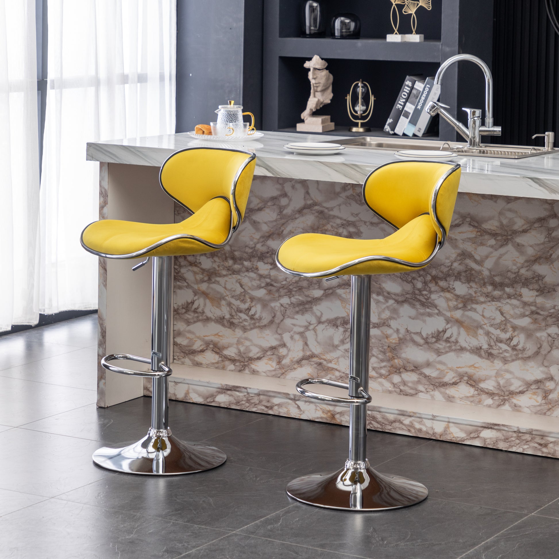 Yellow velvet bar stool with chrome accents and adjustable height