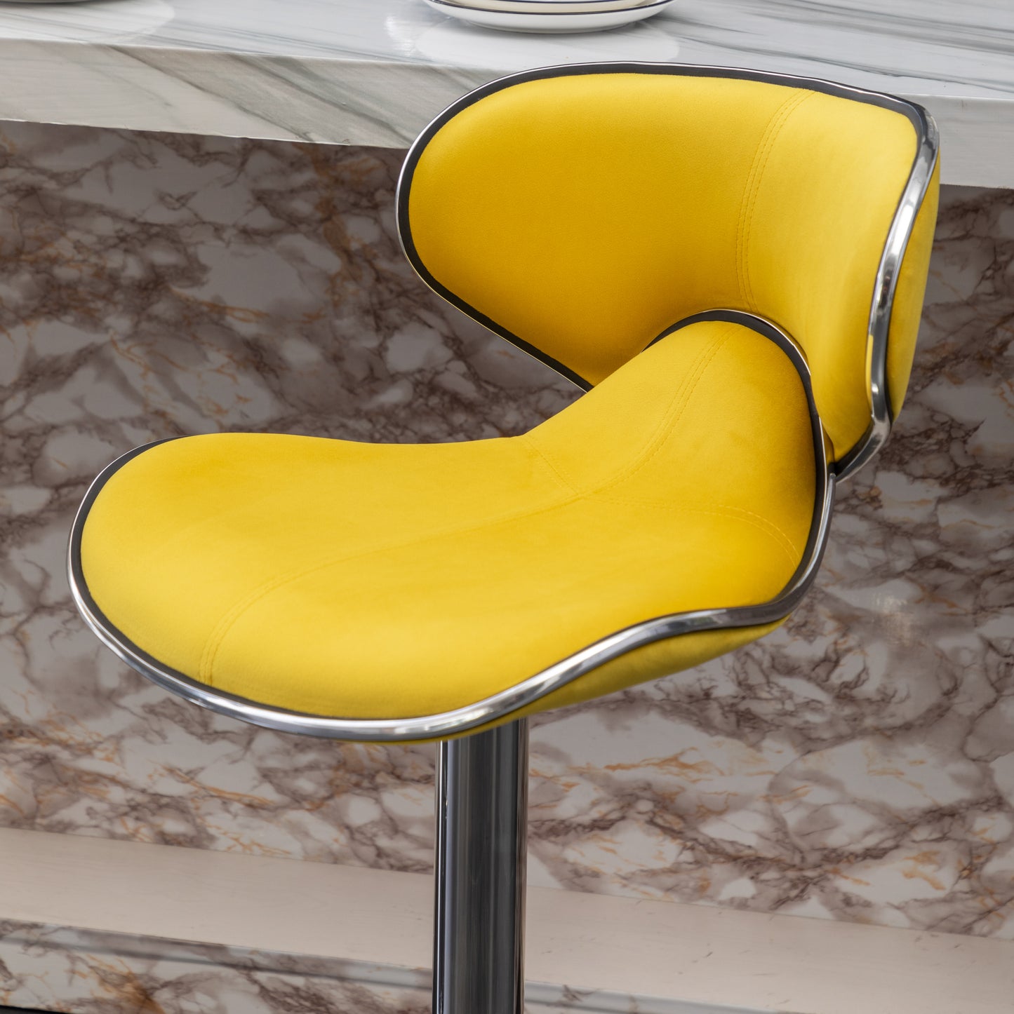 Yellow velvet bar stool with chrome trim