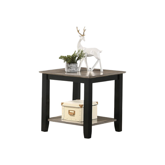 Rustic wood end table with black legs featuring decorative items
