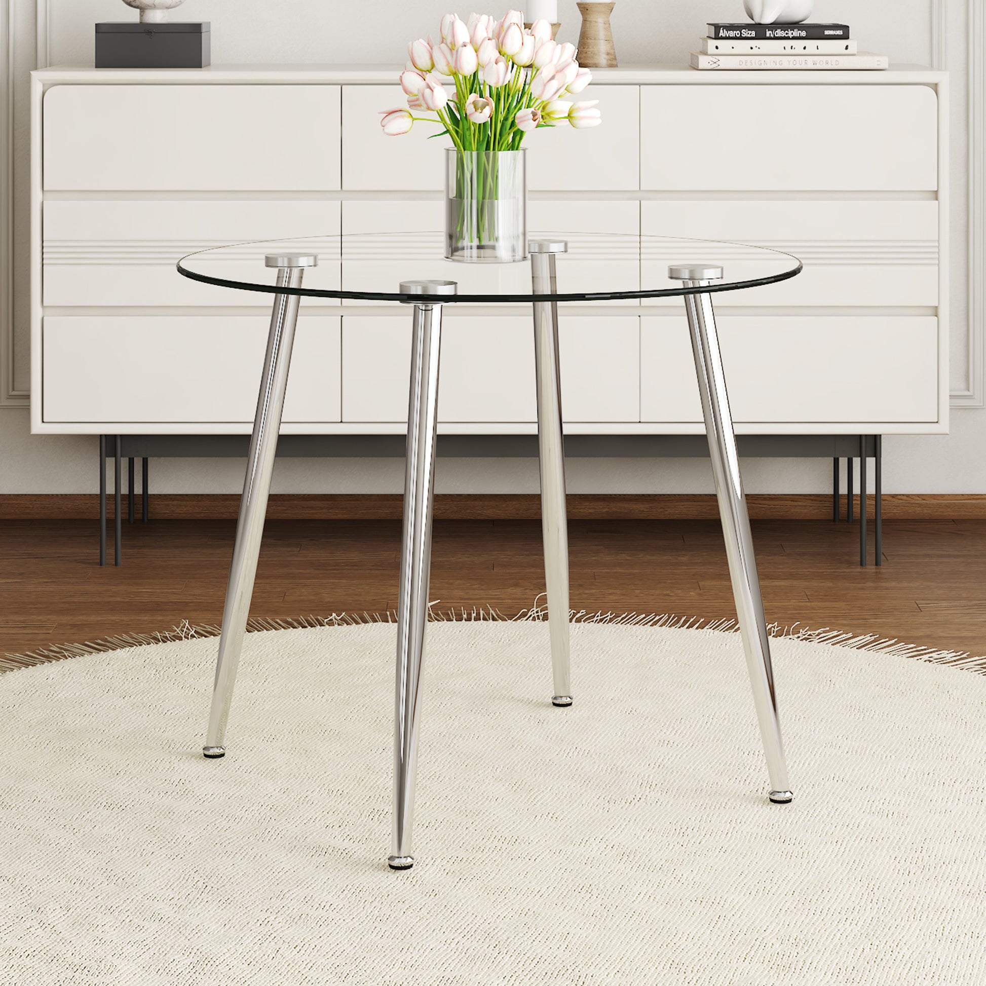 Round glass dining table with chrome legs