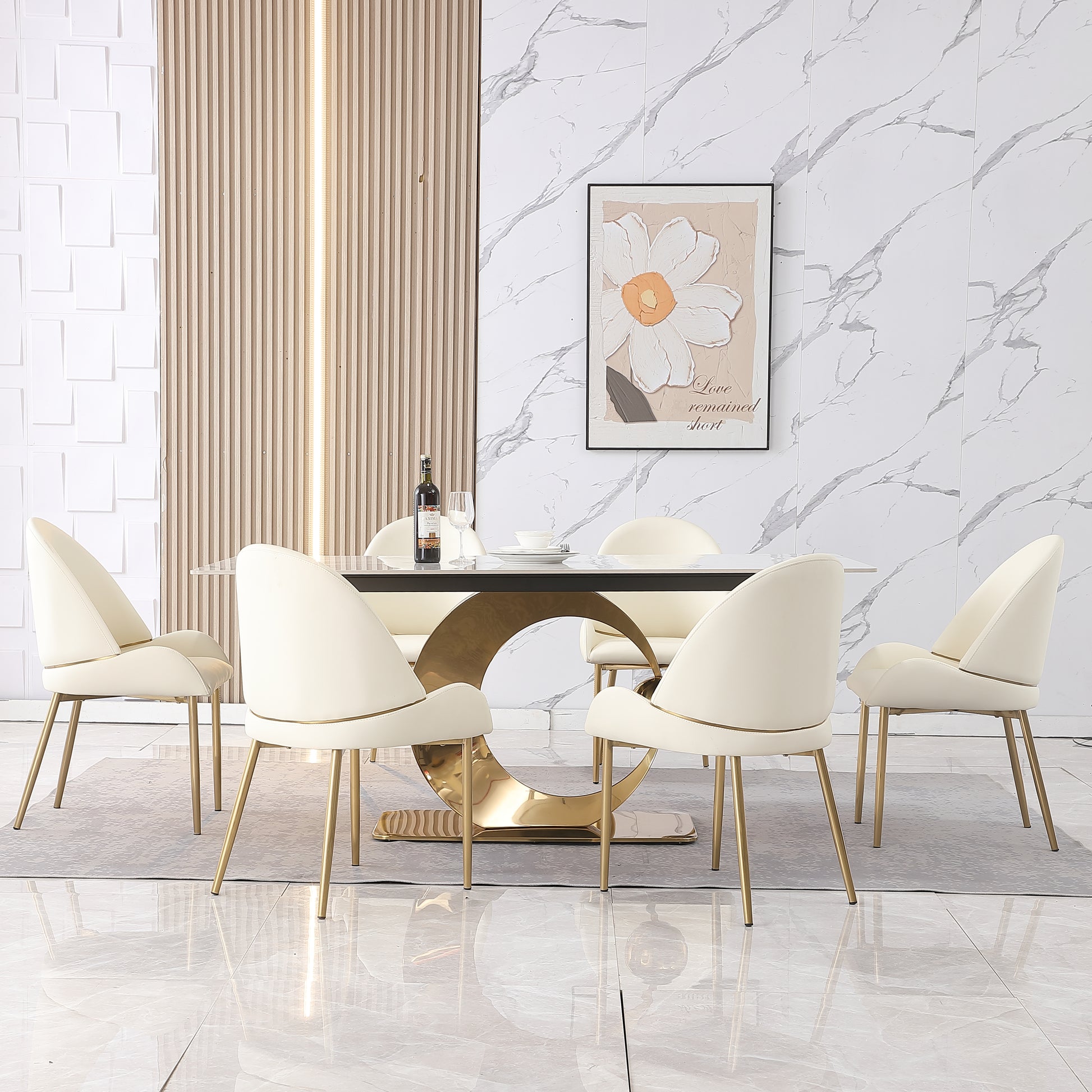 Set of  cream velvet dining chairs with gold legs perfect for modern dining rooms