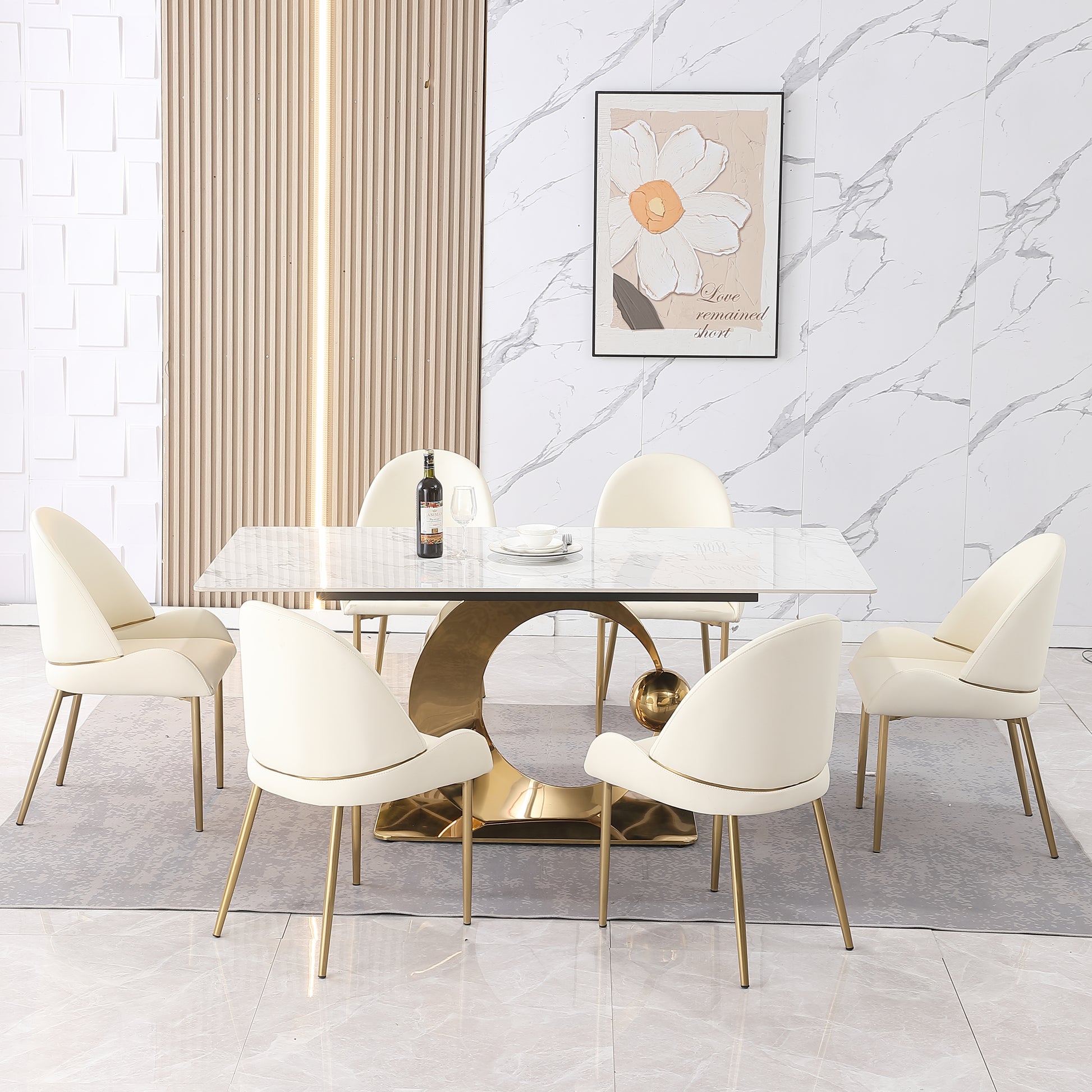 Cream velvet dining chairs with gold legs and modern marble table