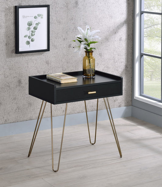 Black accent table with brass hairpin legs and one drawer