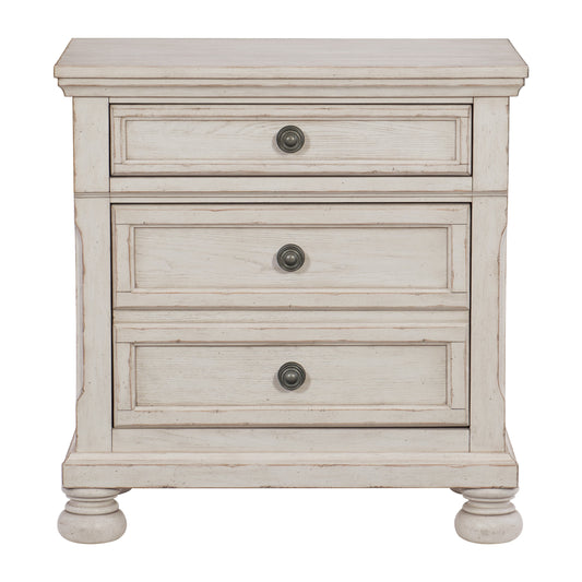 Distressed white wood nightstand with three drawers and antique bronze hardware