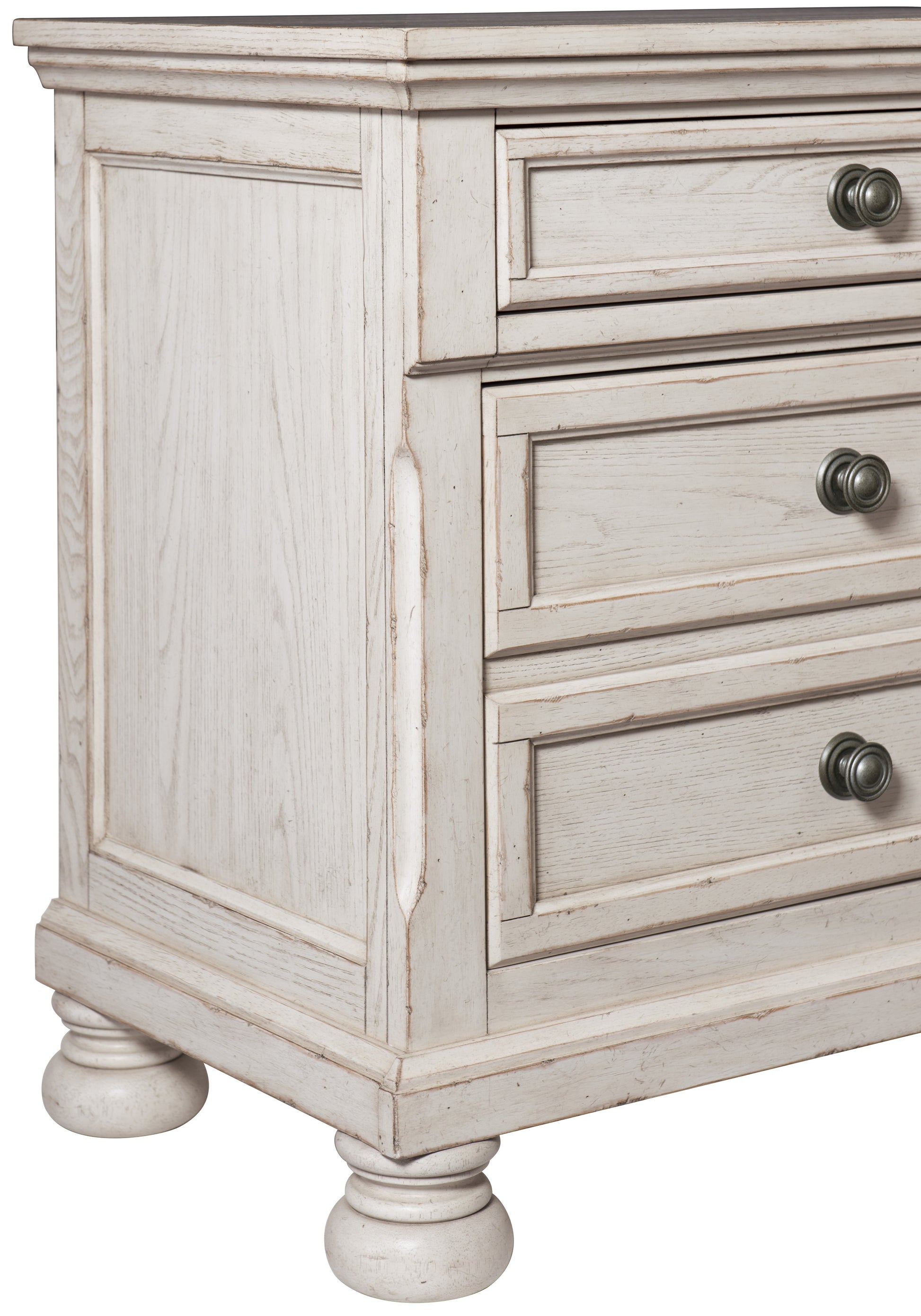 Distressed white wood dresser with ornate metal knobs and turned legs