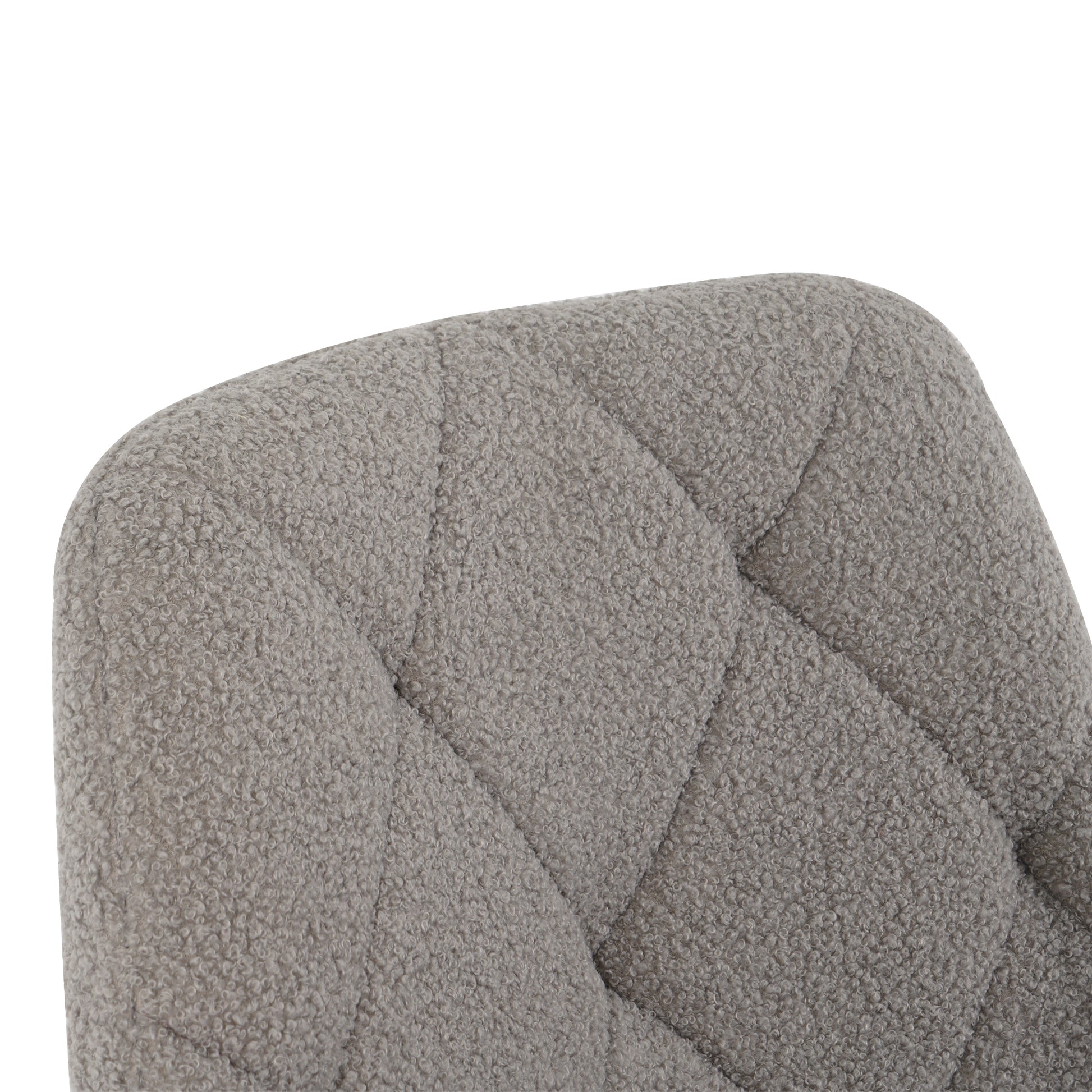 Textured gray boucle fabric on tufted chair back modern style