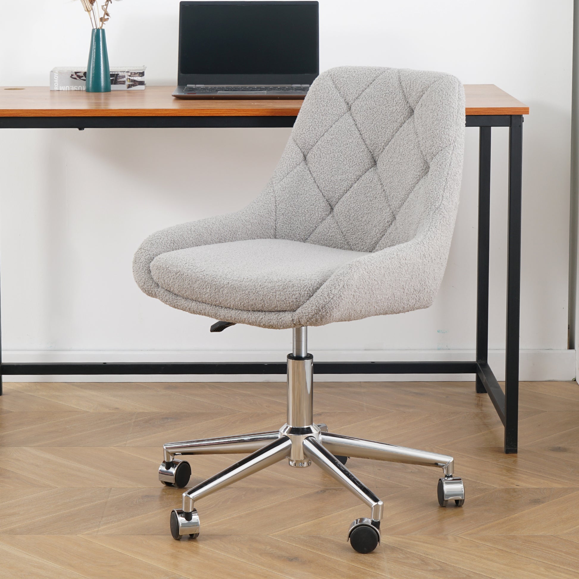 Light gray sherpa office chair with diamond tufting and chrome base