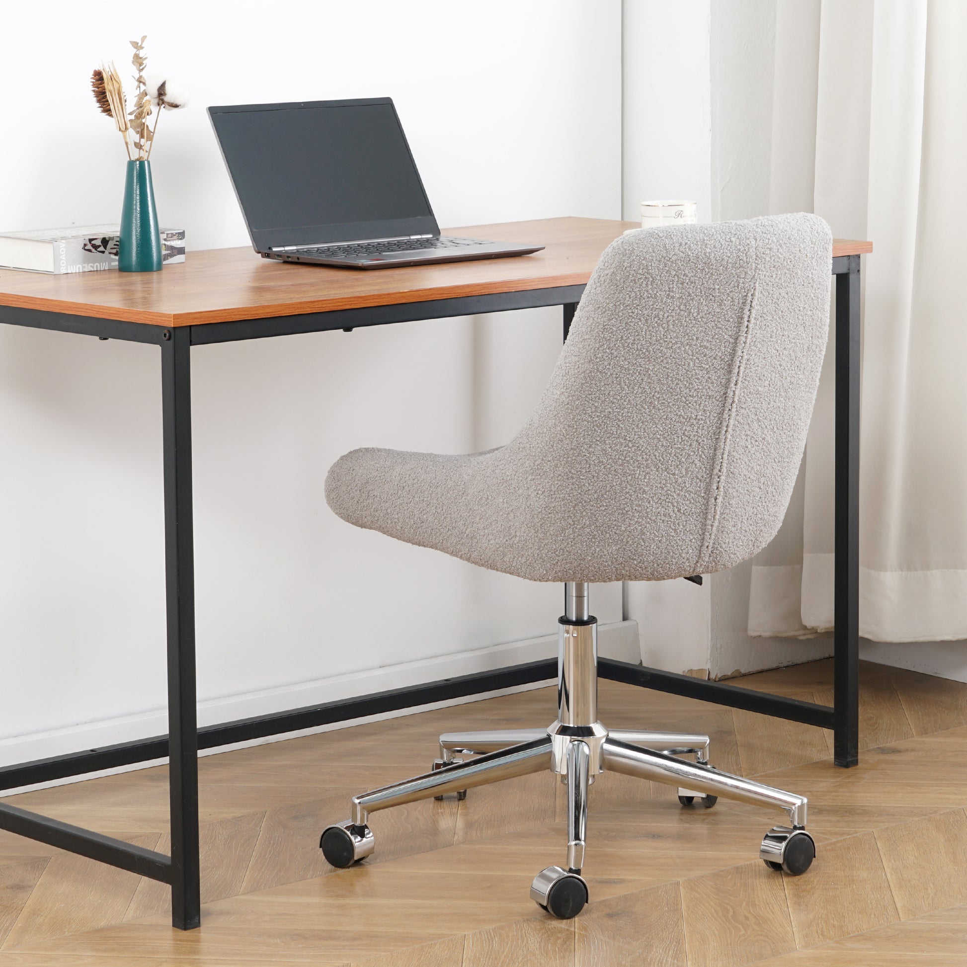 Gray boucle fabric office chair with chrome base and wheels