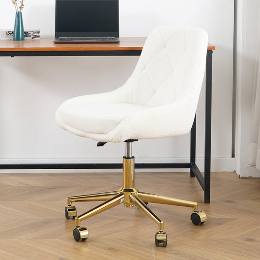 White boucle fabric desk chair with diamond tufting and gold base