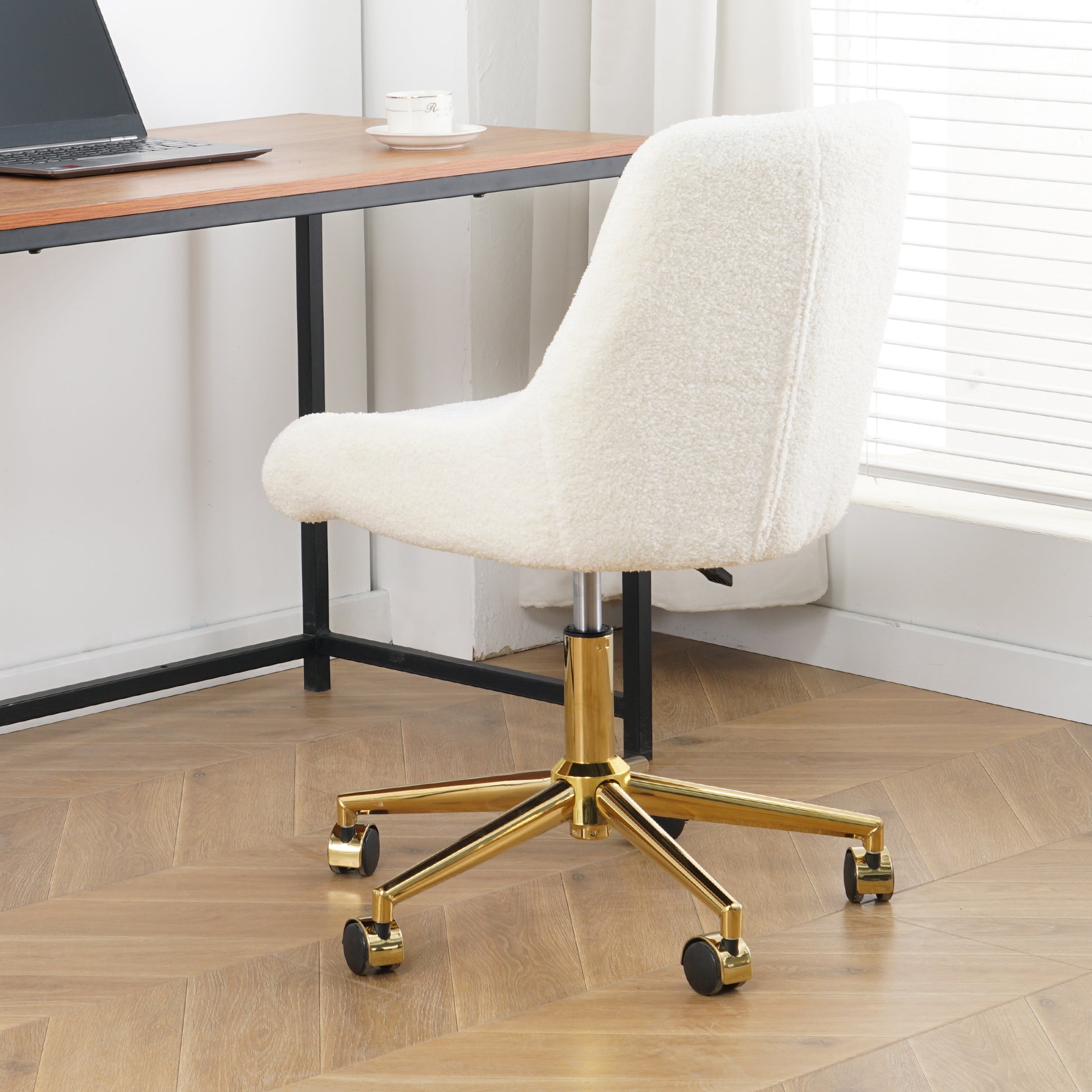 Cream teddy fabric office chair with gold base and wheels