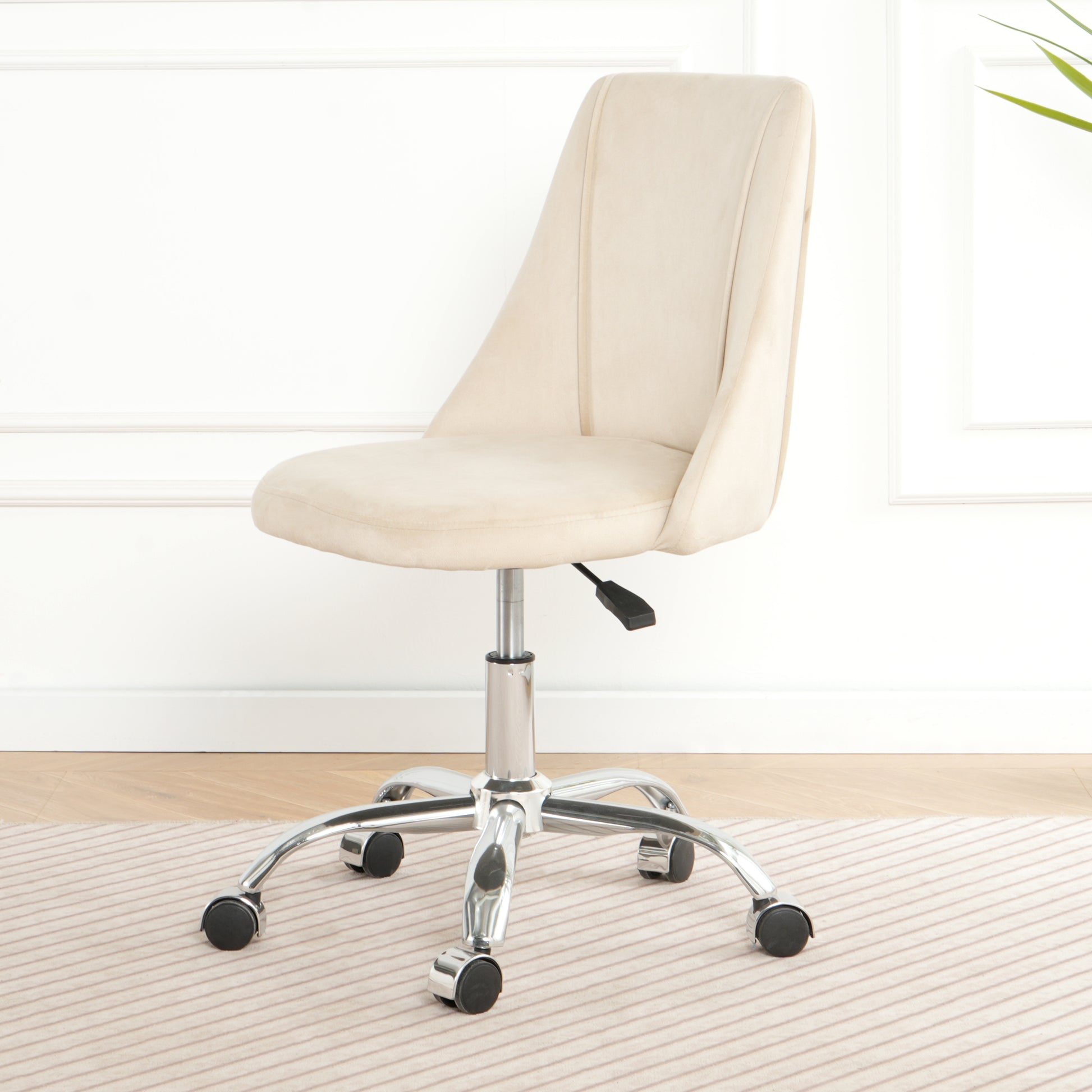 Cream velvet ergonomic office chair with adjustable height and chrome base