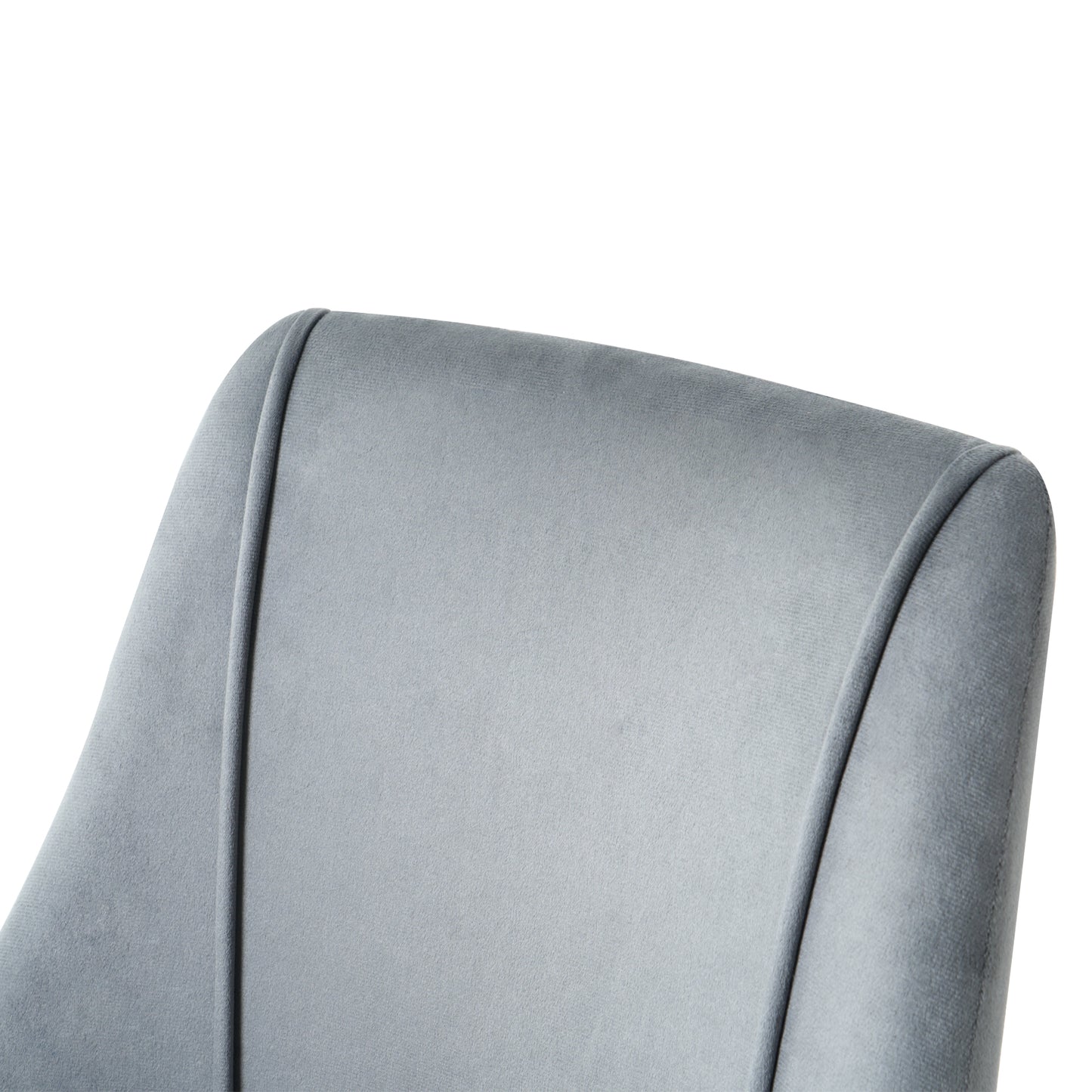 Closeup of a plush grey velvet chair back with subtle stitching