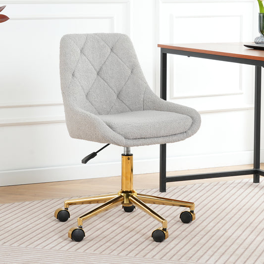 Tufted grey sherpa desk chair with plush fabric and a gold base