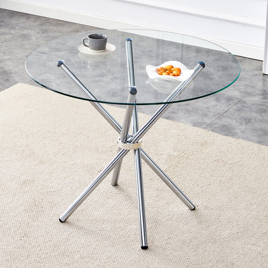 Round glass coffee table with chrome legs and a textured rug