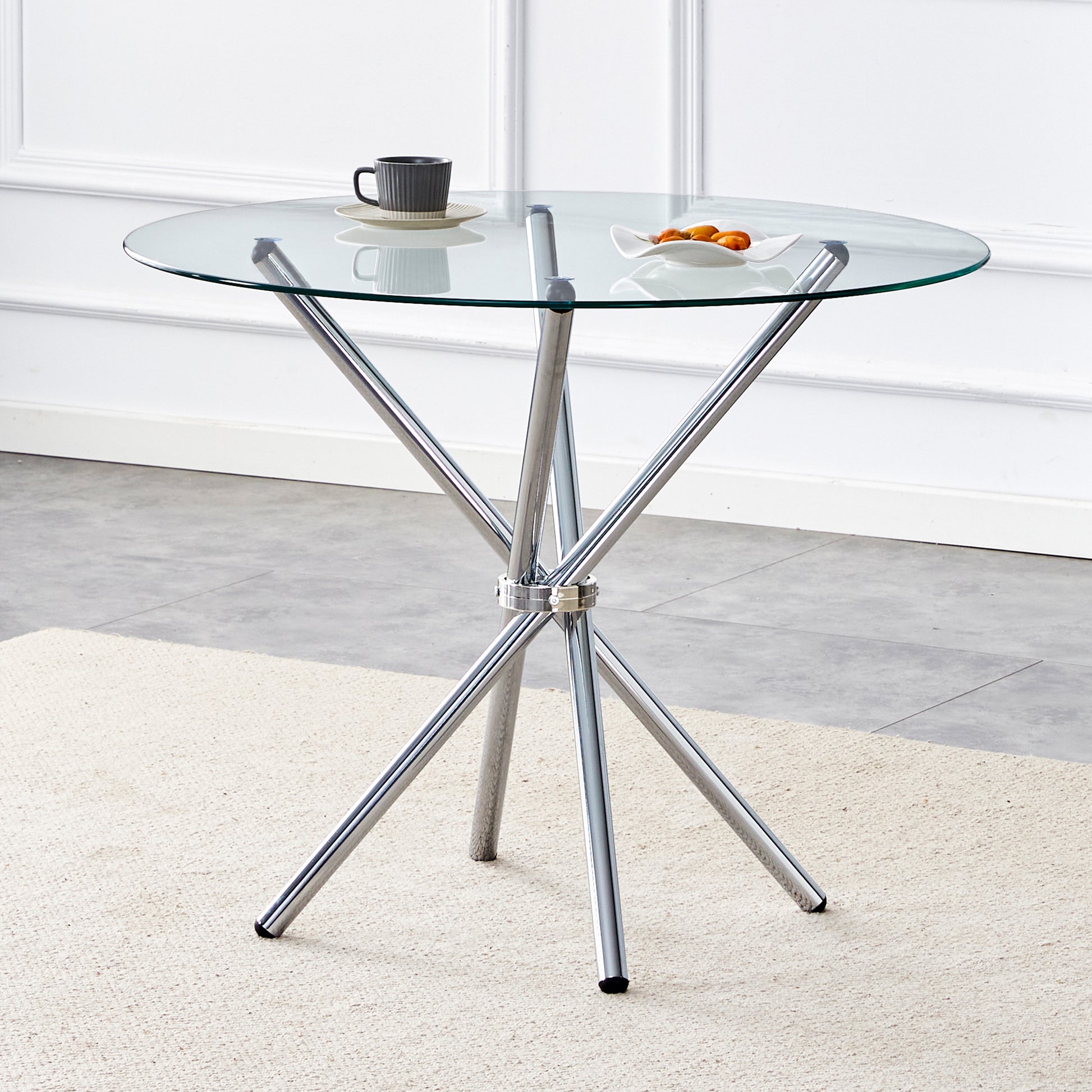 Round glass top dining table with chrome base