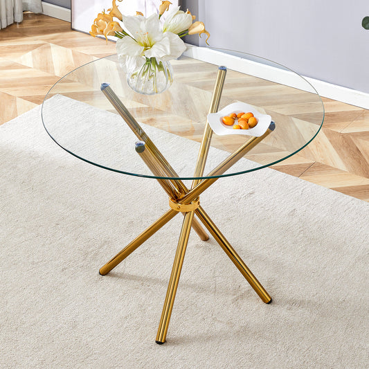Round glass coffee table with gold starburst base