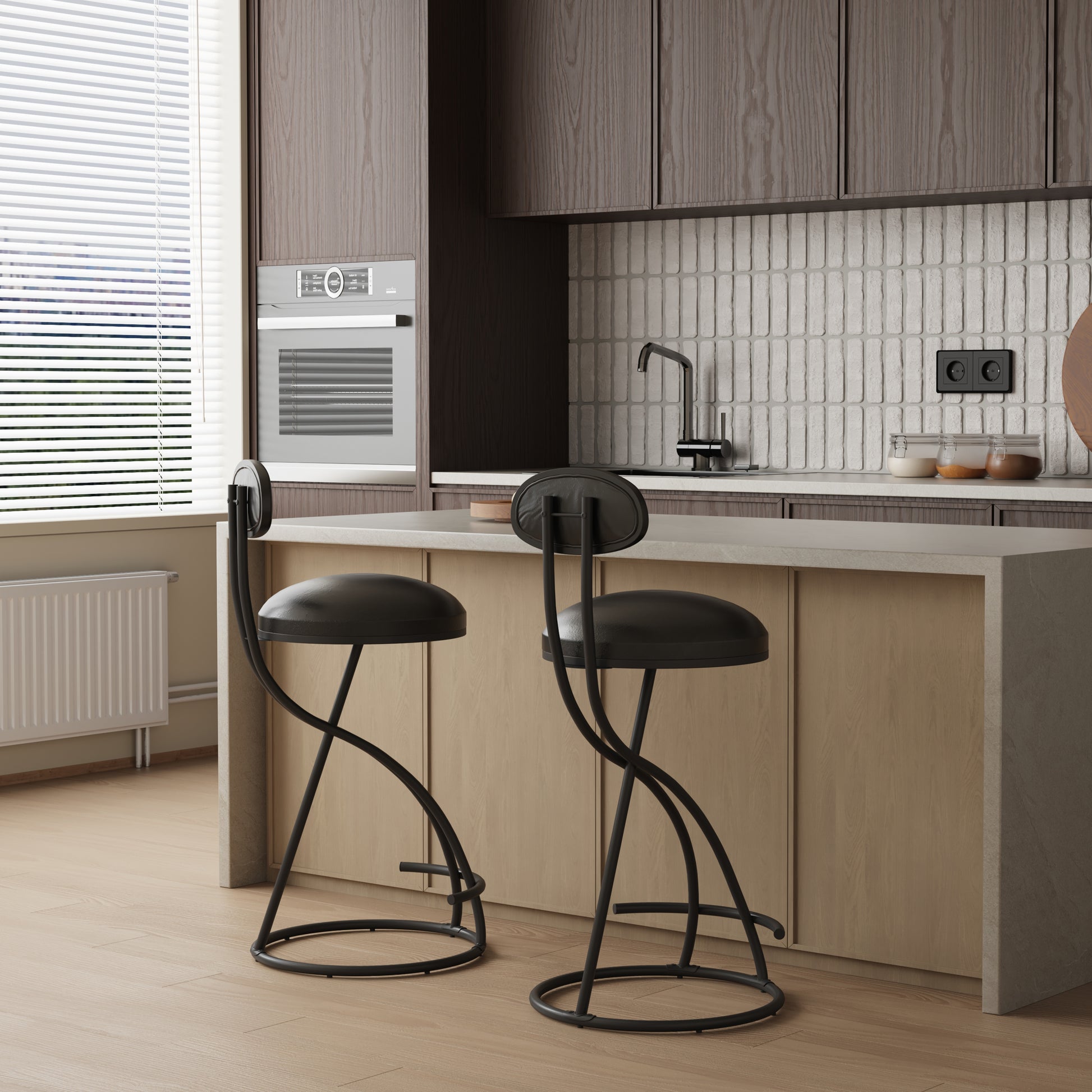 Black modern bar stool with curved metal legs and faux leather seat