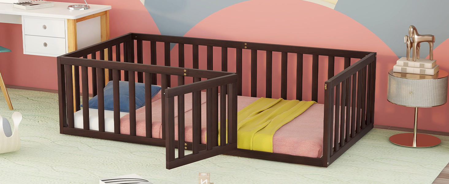 Dark brown convertible crib with pink bedding and yellow blanket