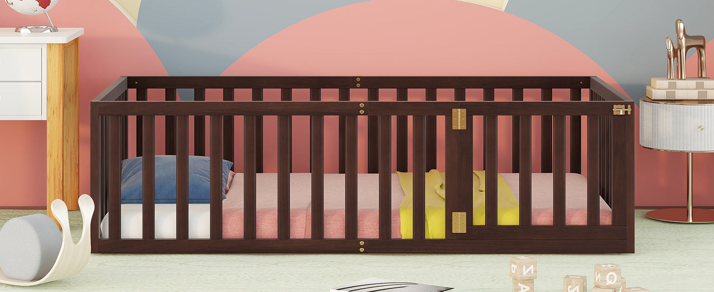 Dark brown wooden baby crib with pink mattress and blue pillow