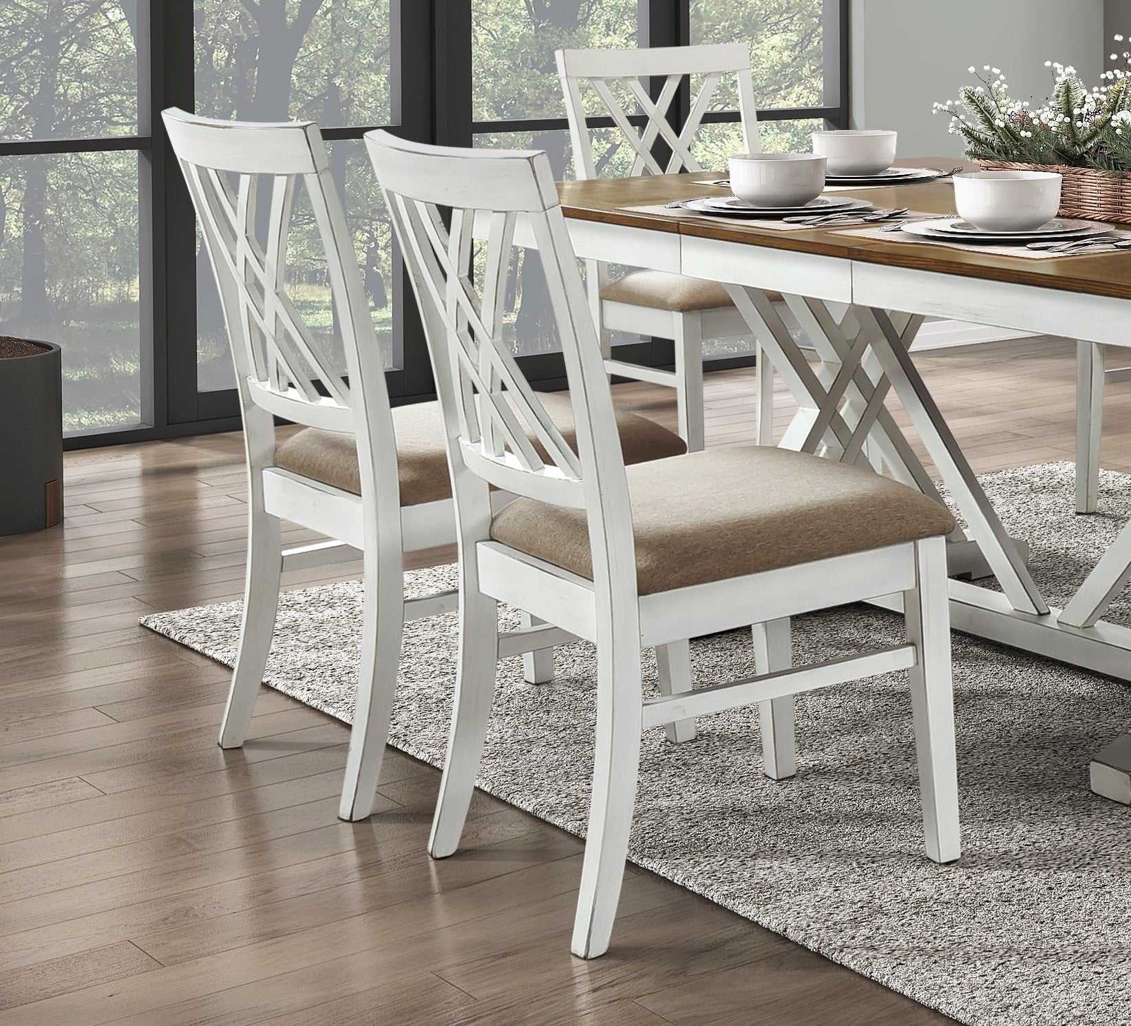 Antique white dining chairs with crisscross backs and upholstered seats