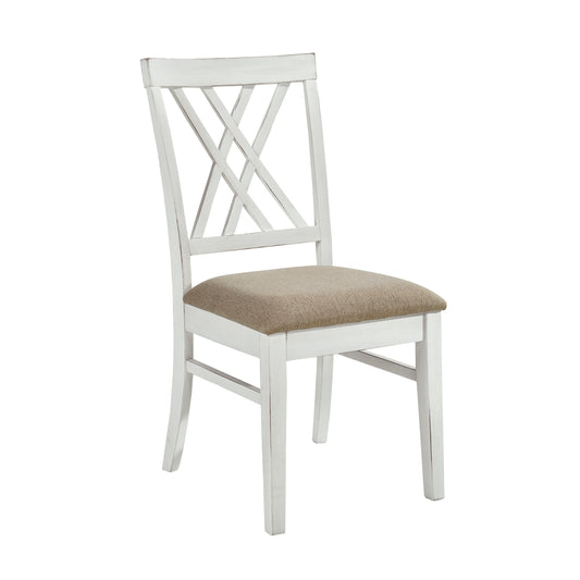 Distressed white wooden chair with beige upholstered seat and crisscross backrest