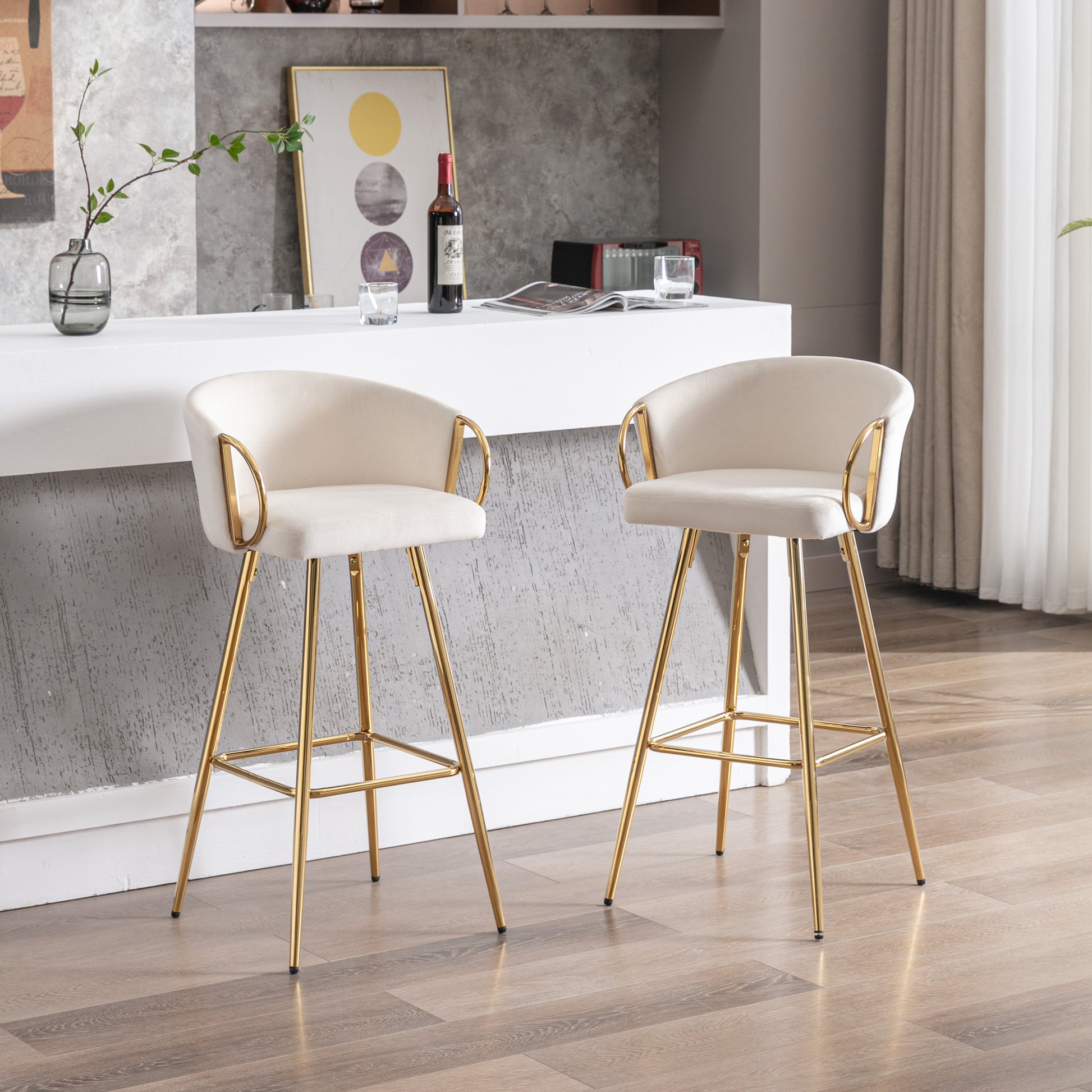 Cream velvet bar stools with gold legs and armrests