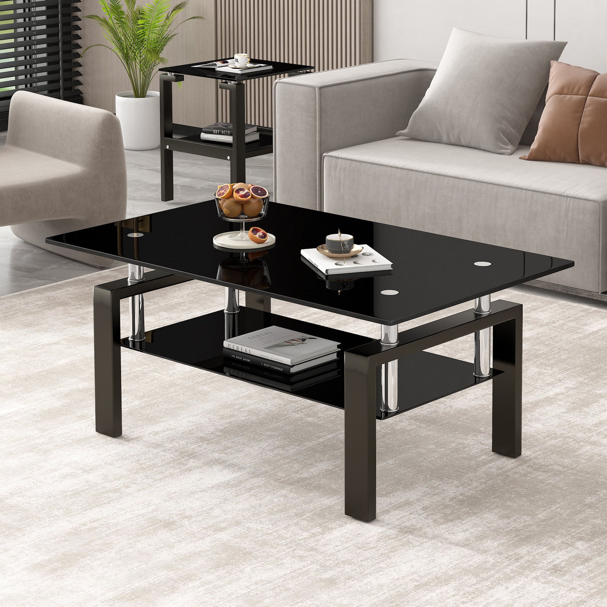 Sleek black glass coffee table with two tiers chrome legs and modern design