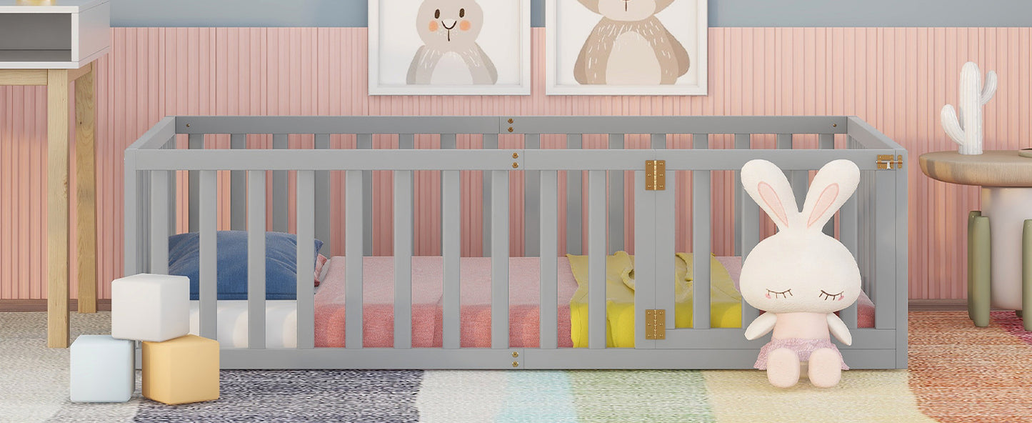 Gray wooden crib with pastel bedding and stuffed bunny