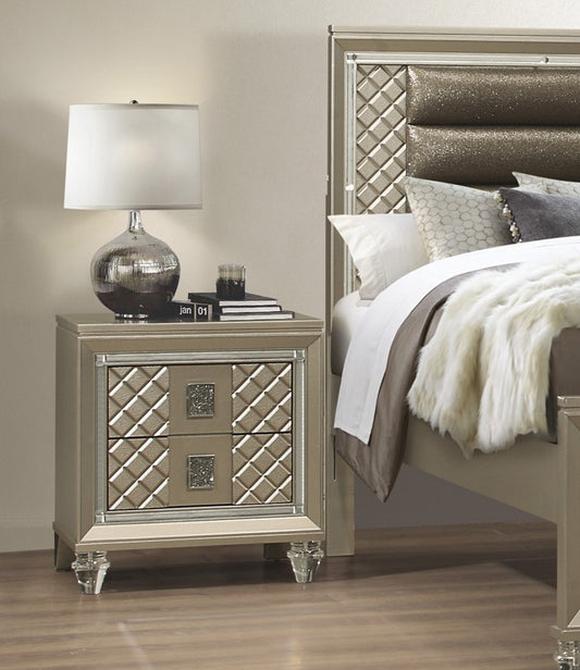 Glamorous champagne nightstand with diamondtufted drawer fronts and crystal knobs
