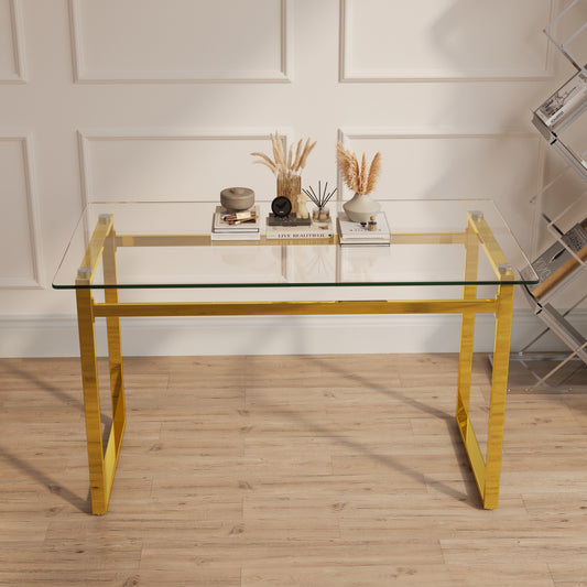 Glass and gold desk with clear tempered glass top and polished gold frame