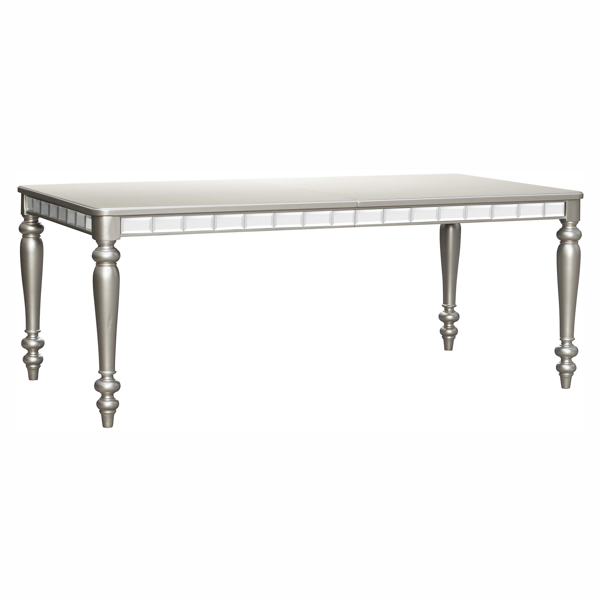 Silver dining table with ornate mirrored trim and turned legs for a glamorous dining room