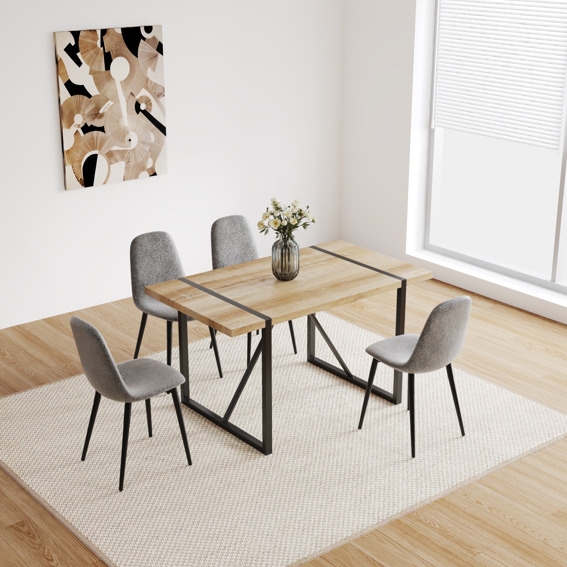 Rustic oak dining table with metal legs and four grey upholstered chairs