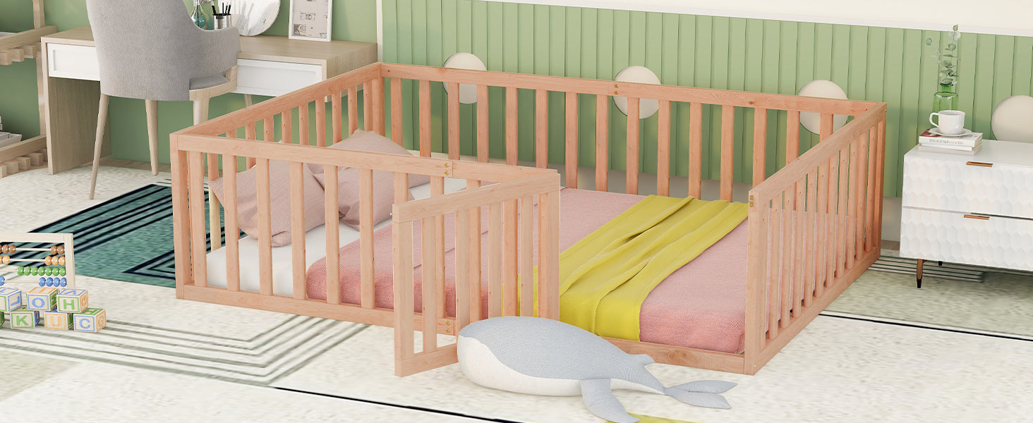 Natural wood toddler bed with protective railing and pink bedding