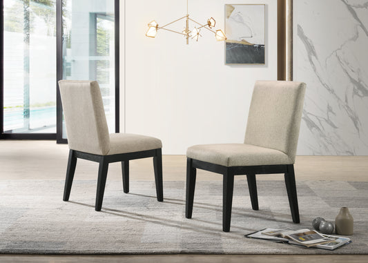 Two upholstered dining chairs with dark wood legs
