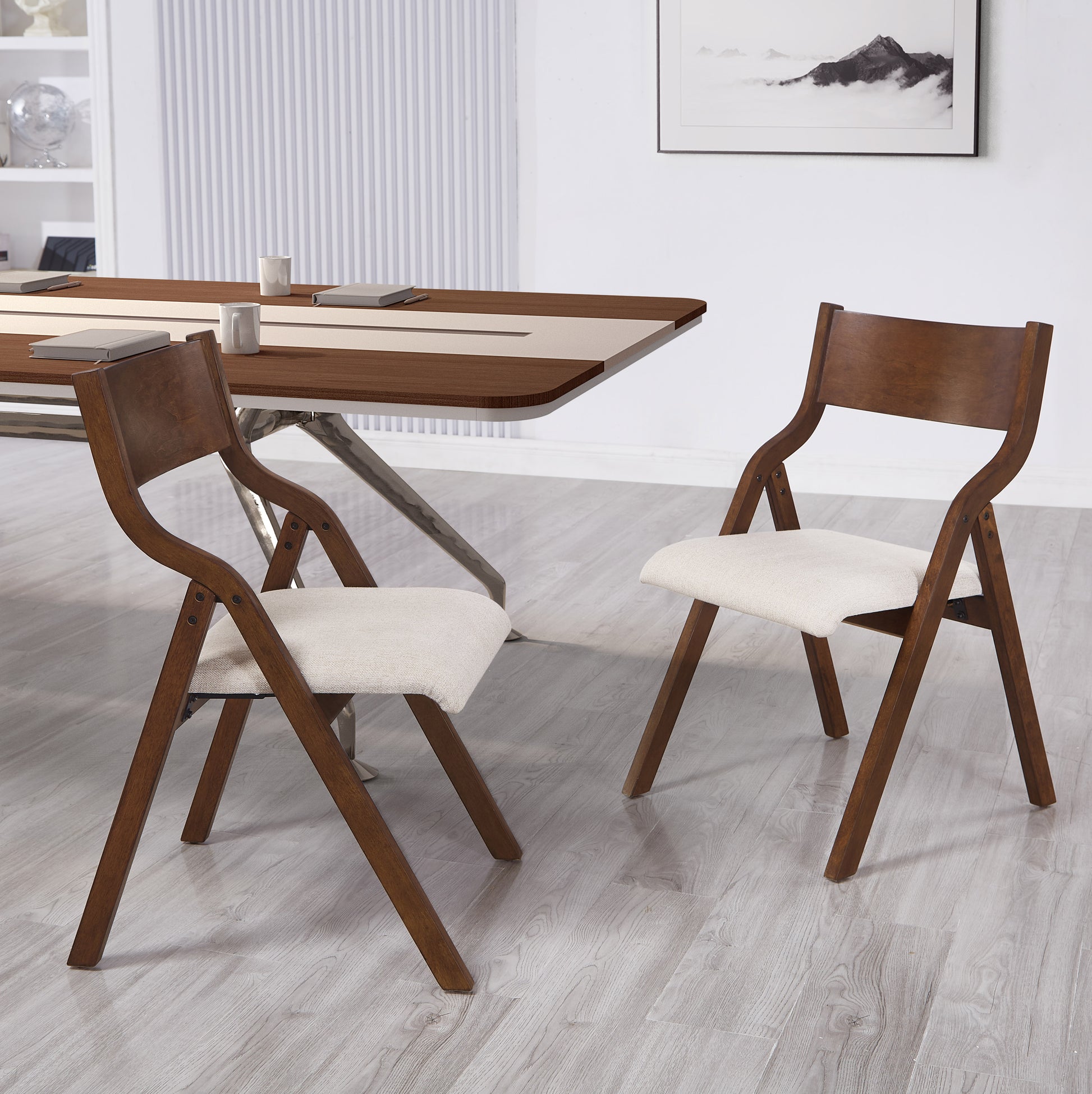 Wooden folding chair with cream cushion and curved back