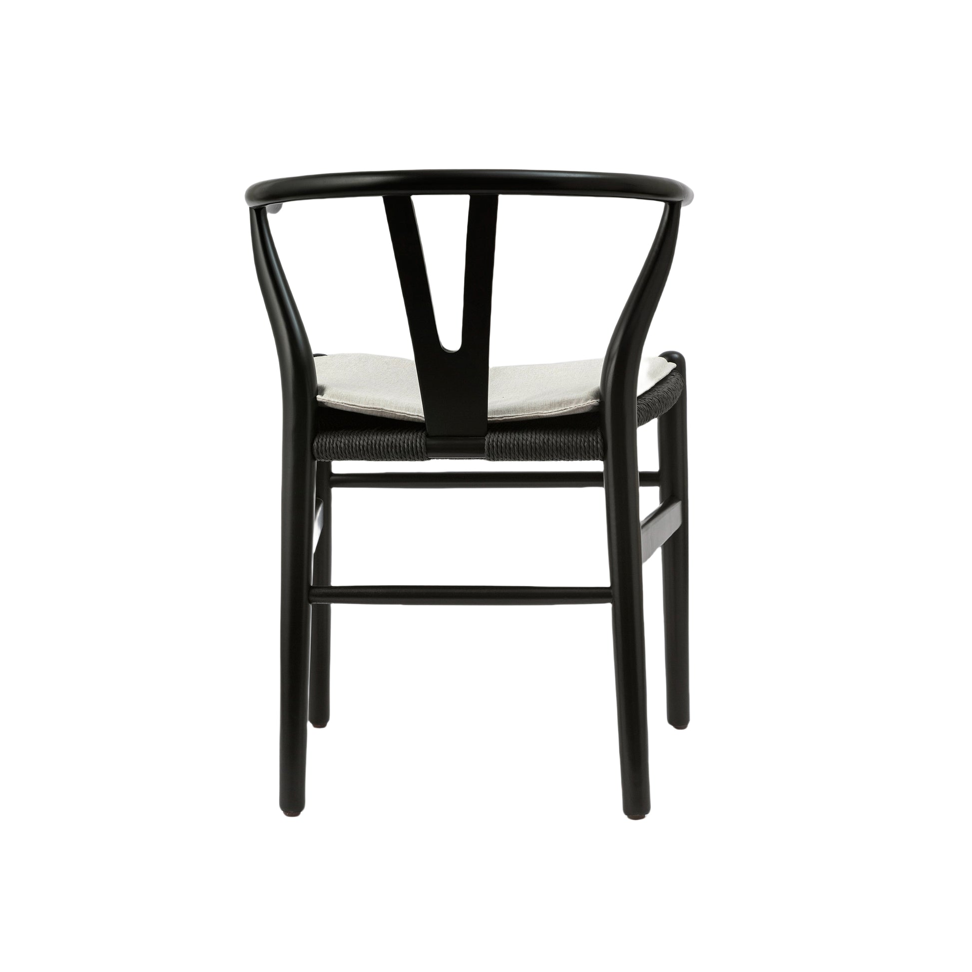 Black modern dining chair with curved back and woven seat