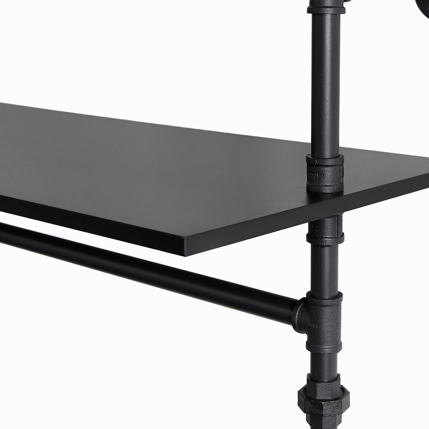 Close up of black metal pipe shelf support