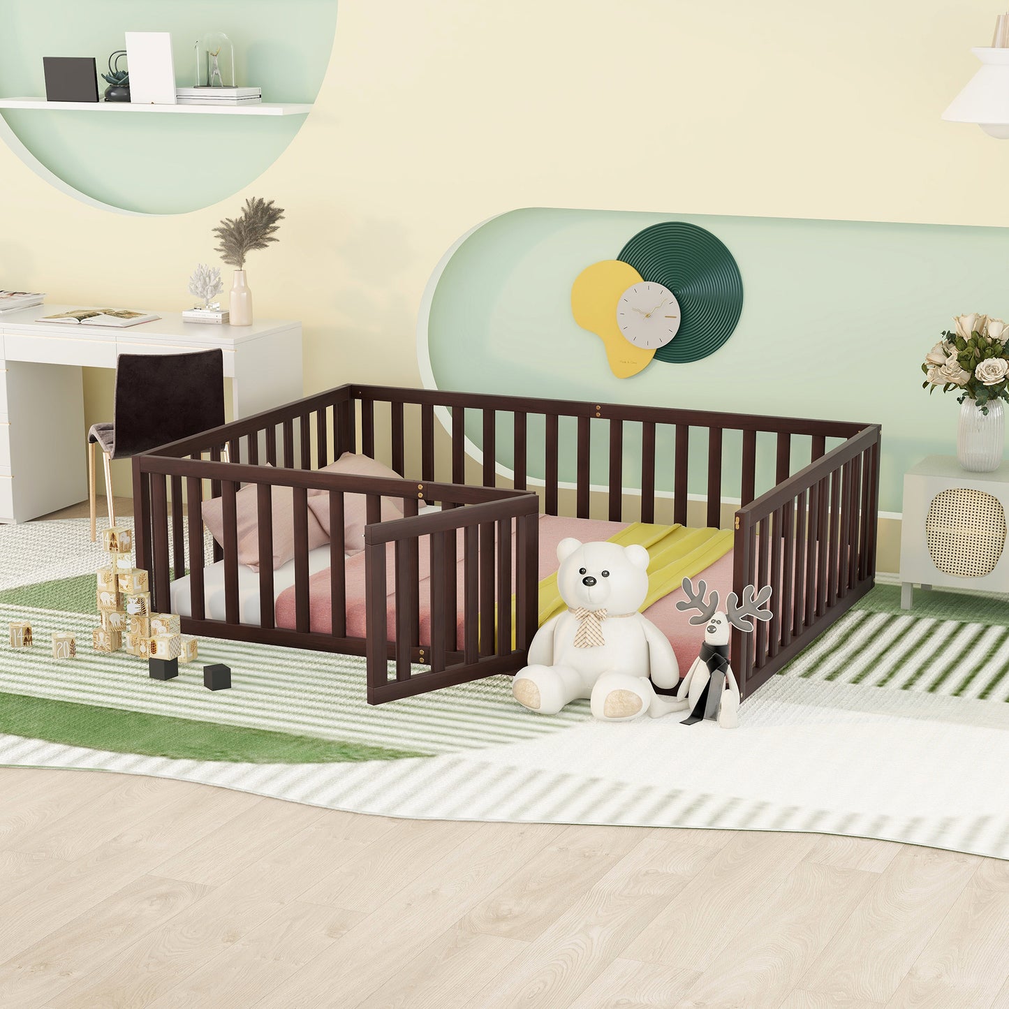 Dark brown wooden baby playpen with soft pink and yellow bedding