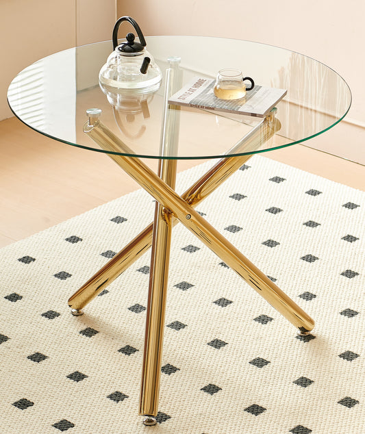 Round glass coffee table with gold metal Xbase