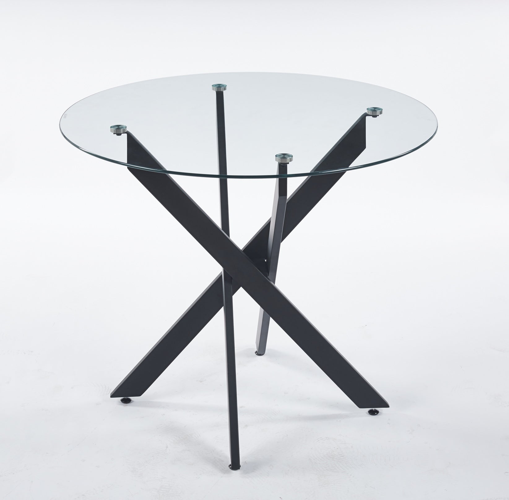 Round glass dining table with black metal Xbase legs