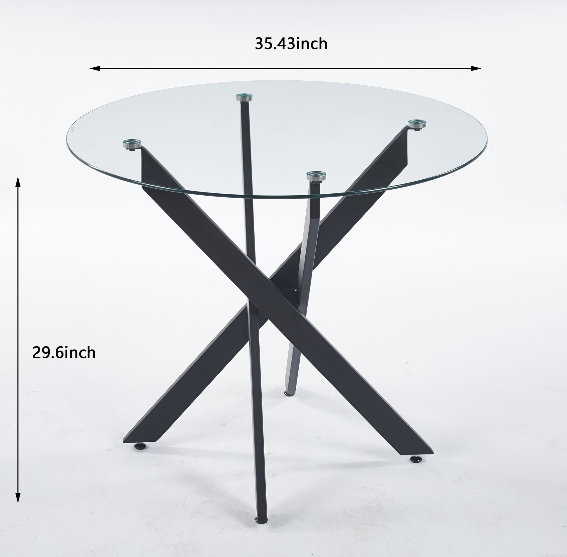 Round glass dining table with black metal Xbase legs and modern design