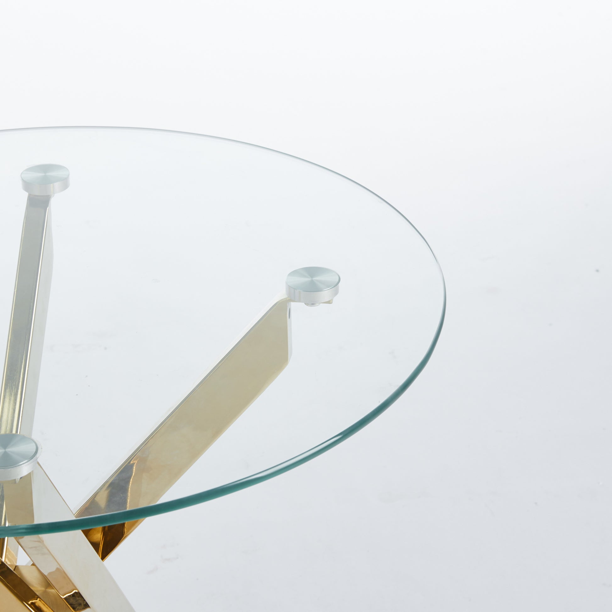 Glass top coffee table with polished brass and chrome base